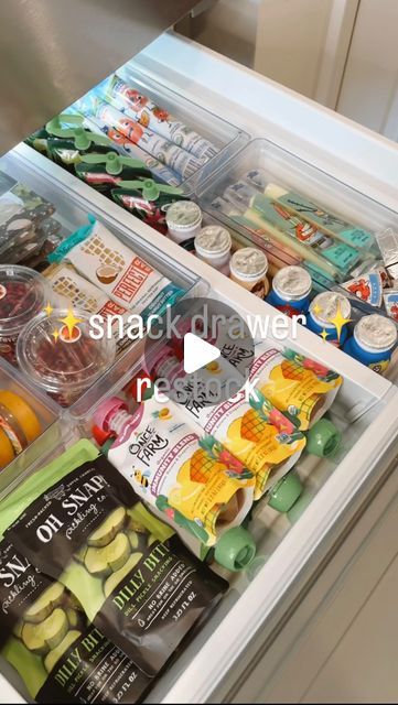 an open refrigerator filled with lots of food next to a freezer door that has snacks and drinks in it