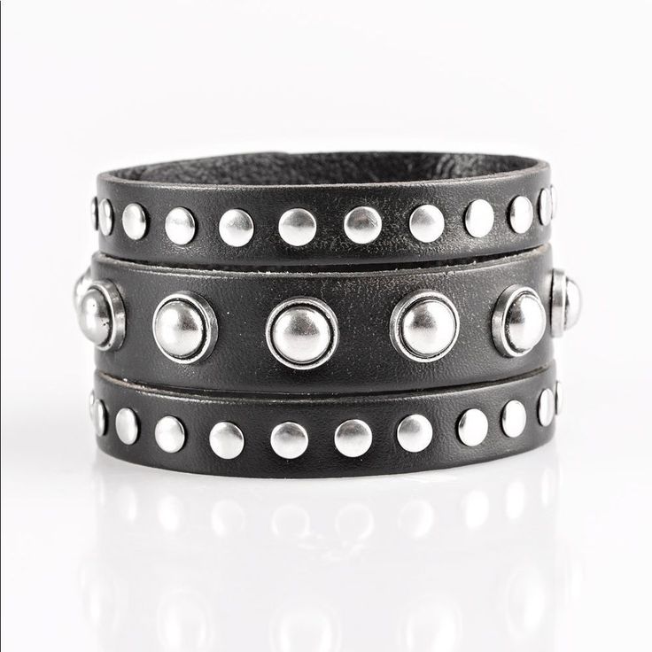 Win Your Spurs - Black Round And Flat Silver Studs Are Studded Across The Front Of A Thick Black Leather Band That Has Been Spliced Into Three Bands. Features An Adjustable Snap Closure. Sold As One Individual Bracelet. Punk Black Bracelet With Silver Studs, Black Leather Punk Bracelet With Silver Studs, Silver Leather Punk Bracelet With Black Band, Punk Style Silver Leather Bracelet With Black Band, Silver Leather Bracelet With Black Band In Punk Style, Edgy Silver Bracelet With Black Band, Edgy Silver Bracelets With Black Band, Black Leather Bracelets With Studs, Black Studded Bracelets For Party