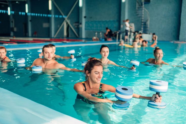 a group of people in a swimming pool