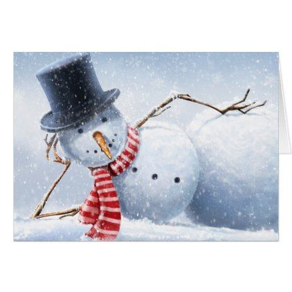 two snowmen wearing hats and scarves in the snow