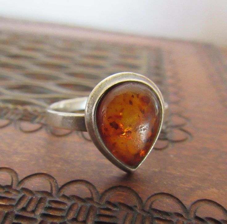 Handmade, this pretty vintage Amber and sterling ring measures a size 8.5.  Stamped it weighs 2.2 grams. K2024 Classic Sterling Silver Pear-shaped Ring, Classic Pear-shaped Sterling Silver Rings, Vintage Sterling Silver Ring With Polished Finish, Vintage Sterling Silver Stackable Rings Stamped 925, Vintage Hallmarked Pear-shaped Rings, Nickel-free Vintage Stackable Rings For Anniversary, Nickel Free Vintage Stackable Rings, Teardrop Hallmarked Ring For Anniversary, Vintage Nickel-free Stackable Rings