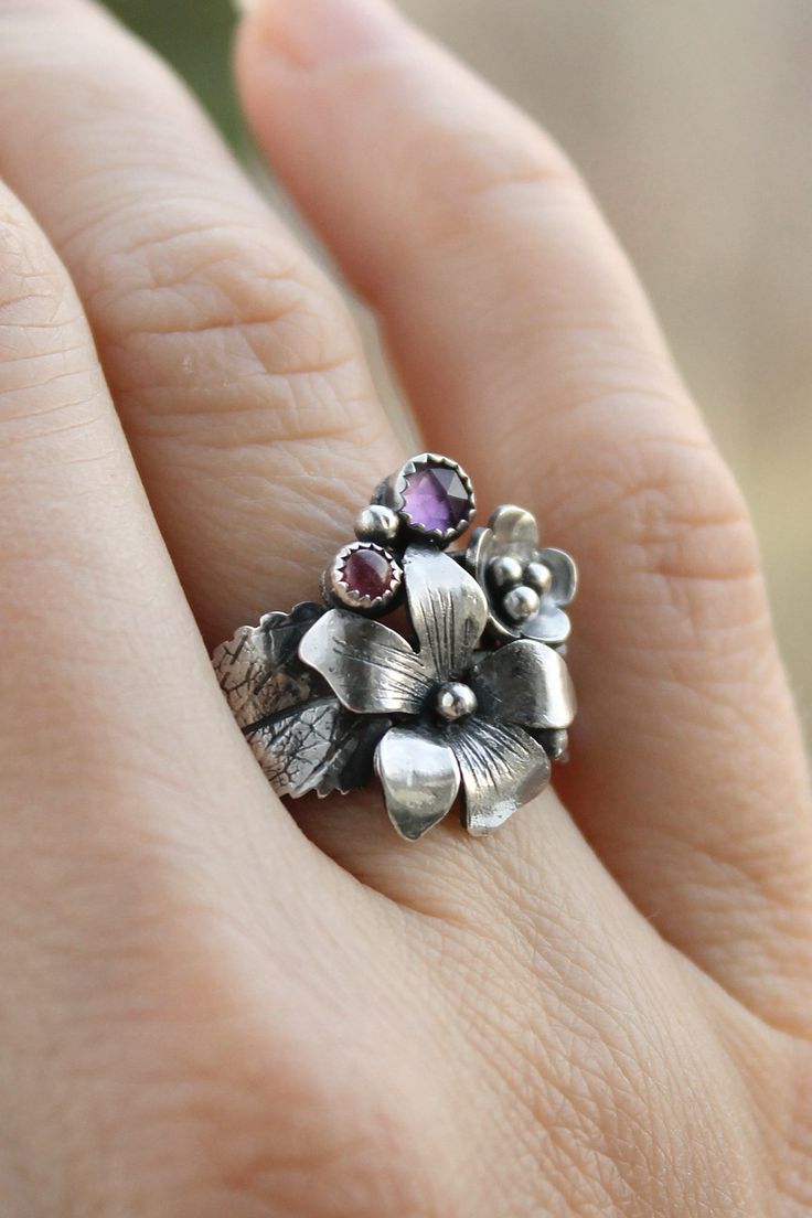 ITEM DESCRIPTION: I can make it any size you want - just mark your size in the order Weight - 4 g I made this viola flower ring from 925 silver, amethyst, and pink sapphire. But you can order it with different stones. This ring is amazing! The tiny flowers and leaves look romantic and delicate on your fingers. This is a real treasure for an elven princess. More viola jewelry in my shop https://www.etsy.com/shop/UrsulaJewelry?ref=seller-platform-mcnav&search_query=viola Unique 3d Flower Jewelry, Unique 3d Flower Shaped Jewelry, Elegant Sterling Silver Flower Ring With Birth Flower, Flower Shaped Sterling Silver Ring With Gemstone, Sterling Silver Flower Shaped Gemstone Ring, Botanical Flower Wedding Jewelry, Delicate Flower-shaped Gemstone Rings, Delicate Flower Shaped Gemstone Ring, Sterling Silver Flower Ring For Wedding