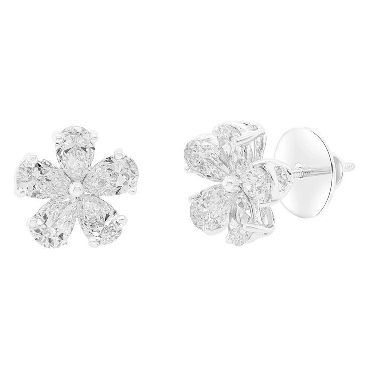 18Kt White Gold Diamond Flower Earrings Featuring 6.05cts or 12 GIA certified pear shape matching diamonds. D-G in color and VS clarity. Flower Diamond Earrings, Gold Earring Studs, Antique Diamond Earrings, Diamond Flower Earrings, Yellow Gold Diamond Earrings, White Gold Earring, Diamond Huggie Earrings, Expensive Jewelry Luxury, Gold Diamond Studs