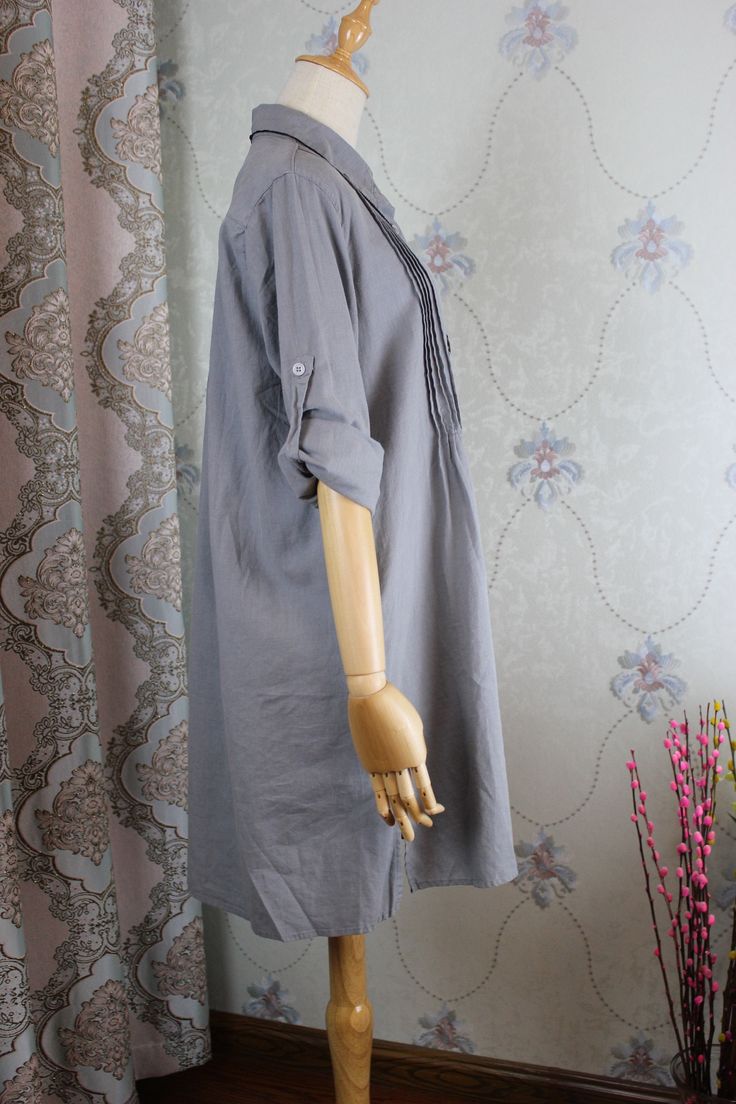 "【Fabric】 Cotton 【Color】 gray 【Size】 Shoulder width 42cm/ 16.4 sleeve length 60cm / 23.4\" Cuff circumference 24cm/ 9 Bust 108cm / 42\" Waist circumference 122cm/ 48 Length 90cm/ 35\" Washing & Care instructions: -Hand wash or gently machine washable do not tumble dry -Gentle wash cycle (40oC) -If you feel like ironing (although should not be necessary) , do it with steam or while the dress is still slightly wet -Do not bleach If you like this dress, perhaps you will also like other dresses Gray Relaxed Fit V-neck Shirt, Solid Color Long Sleeve Shirt With Rolled Sleeves, Casual Long Sleeve Shirt With Cuffed Sleeves, Oversized Long Sleeve Shirt In Gray, Long Sleeve Gray Shirt For Summer, Oversized Gray Long Sleeve Shirt, Gray Long Sleeve Summer Shirt, Gray Long Sleeve Shirt For Summer, Summer Long Sleeve Gray Shirt