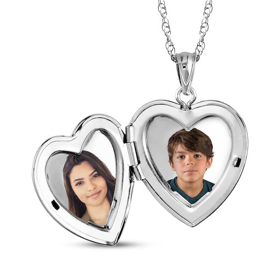 This petite locket lovingly keeps two photos close to your heart. Crafted in sterling silver Polished to a bright shine, the 20mm heart-shaped locket opens to reveal two photos The 18-inch rope chain secures with a spring ring clasp Please follow these steps: 1) Place your order; 2) Text your photo from your smartphone to (330) 435-8997; and 3) When prompted, please respond with your Order Confirmation #. Standard text messaging rates may apply. Mother's Day White Gold Locket Necklace Keepsake, Double Heart Locket Necklace In White Gold, White Gold Locket Necklace For Mother's Day Keepsake, Double Heart White Gold Locket Necklace, White Gold Double Heart Locket Necklace In Sterling Silver, White Gold Double Heart Locket Necklace, Sterling Silver Double Heart Locket For Mother's Day, Personalized Double Heart Sterling Silver Locket Necklace, Personalized White Gold Open Heart Locket Necklace