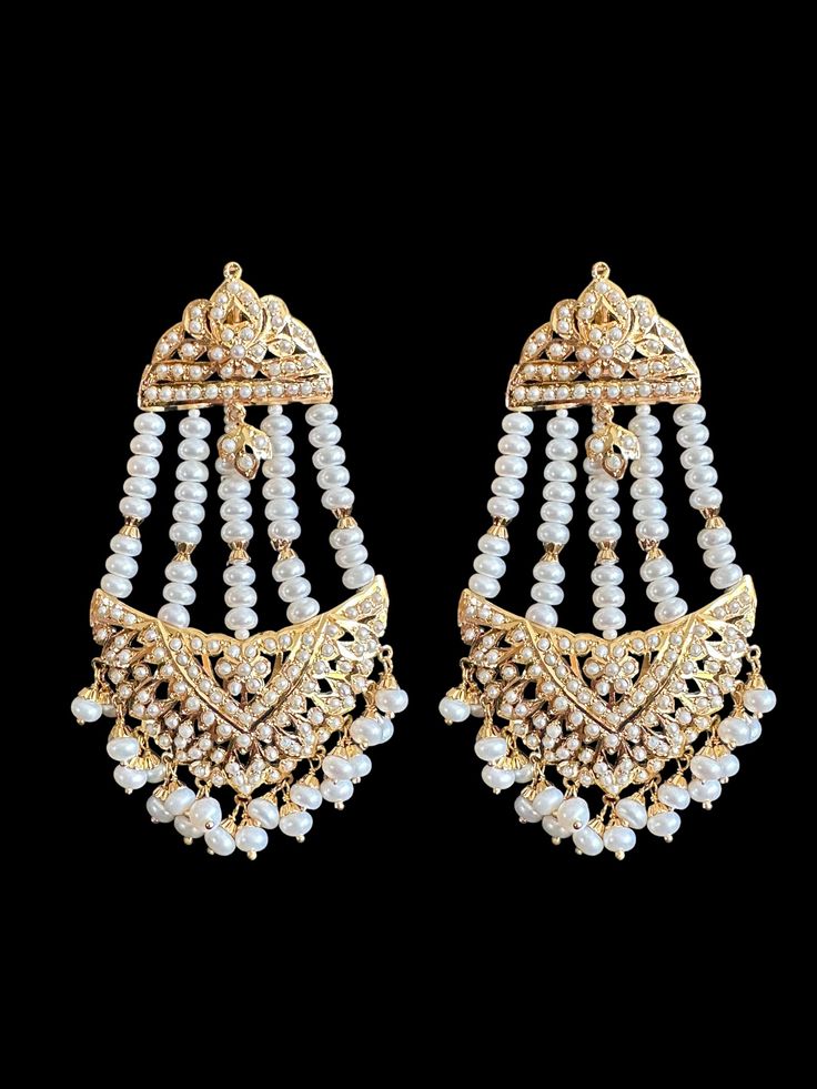 Jhoomar earrings 92.5 silver - gold plated made using fresh water pearls gwt-34.68 GMs White Chandbali Pearl Earrings For Reception, Elegant White Tilla Chandbalis, Temple Jewelry Chandbali Earrings With Pearl Chain, Pearl Chain Chandbali Temple Earrings, White Kundan Chandbali Chandelier Earrings, White Kundan Chandelier Earrings For Receptions, White Pearl Chain Gold-plated Earrings, Temple Jewelry Chandelier Earrings With Pearl Drop, White Chandbali Chandelier Earrings For Reception