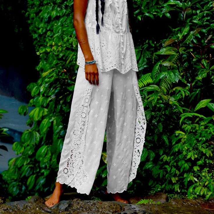 Designed From A Breathable Lightweight Fabric, The Eleuthera Wrap Pants Embodies Stylish Simplicity And Versatility. Crafted In Optic White, These Pants Are Defined With A Drawstring Elastic Waist For A Comfortable Fit And Boast Flourishing Blooms That Cascade Down The Side Of The Leg. Keep It Simple By Pairing With A Plain Tee Or Dress Up For The Evening By Styling With A Blouse. Wide Leg Vacation Sets, White Wide-leg Pants Sets For Summer, White Vacation Sets With Long Pants, White Wide Leg Beach Sets, White Bohemian Wide Leg Set, Wrap Pant, Army Field Jacket, Linen Joggers, Cut Out Leggings