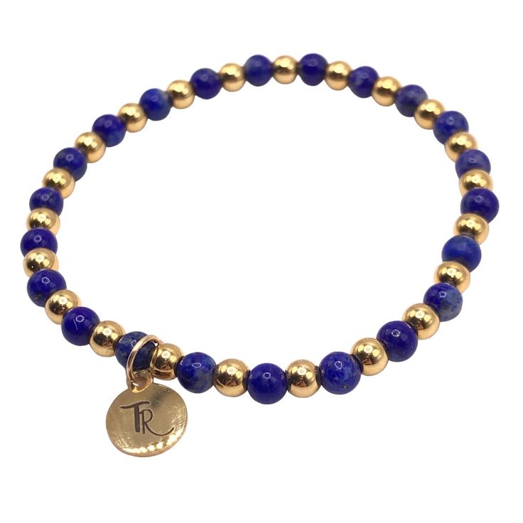 Blue Lapis Lazuli and Gold Beaded Stretch Bracelet Accented with 18K gold filled 4mm beads 4mm deep blue lapis beads Every bracelet I design is carefully thought out and crafted. Each individual bead is selected for its color, vibrancy, and size. I pay careful attention to how each bracelet lays on the wrist, how they nestle together as a stack, and how comfortable they are to wear together and individually. size: small 6.5" - 7"size: med 7" - 7.5" Blue Stretch Bracelet With Gold Round Beads, Blue Stretch Bracelet With Gold Beads, Gold Lapis Lazuli Beaded Bracelets With Round Beads, Hand-strung Gold Lapis Lazuli Bracelets, Gold Beaded Lapis Lazuli Bracelets, Gold Charm Bracelet With Gemstone Round Beads, Gold Lapis Lazuli Spiritual Bracelets, Gold Lapis Lazuli Bracelets For Gift, Lapis Lazuli Blue