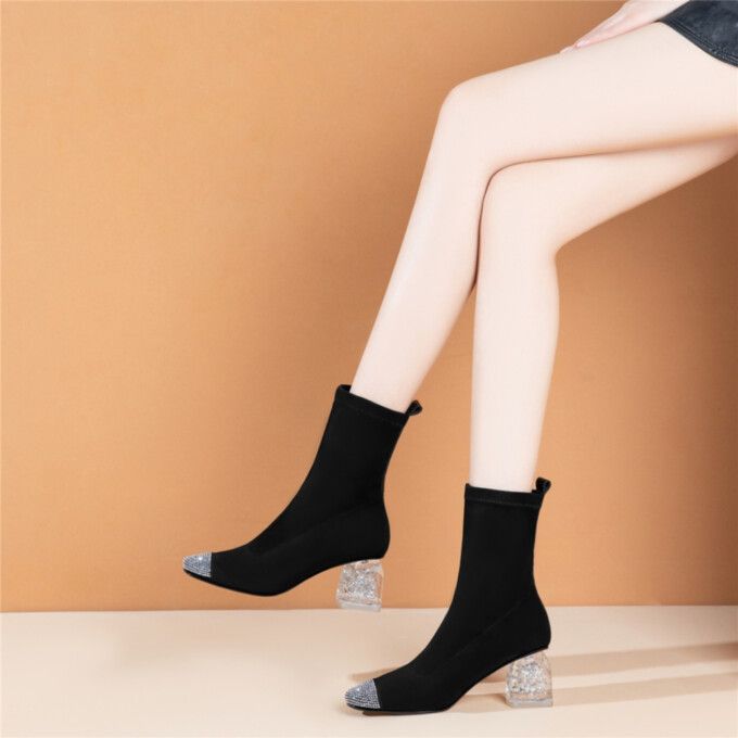 $69.00 Winter Heels With Reinforced Block Heel, Black High Heel Martin Boots Medium Width, Ankle-high Martin Boots With Reinforced Heel For Party, Black High Ankle Heeled Boots With Metal Feet, Chic Black High Heel Martin Boots, Black Block Heel Martin Boots For Winter, Winter Ankle-high Heeled Boots With Contrasting Heel Counter, Trendy High Heeled Boots With Metal Feet, Trendy High Heel Boots With Metal Feet