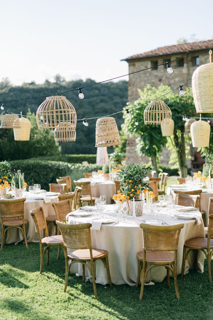 an outdoor dining area with tables and chairs