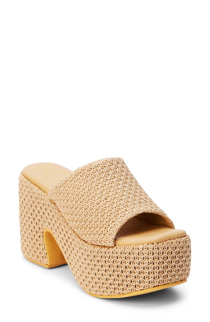 A woven finish adds abundant texture to an arch-supporting sandal set on a retro-chic platform sole. 4 1/4" heel; 2 1/2" platform Contoured footbed with arch support Synthetic upper, lining and sole Imported Comfortable Straw Platform Wedge Sandals, Summer Platform Heels In Synthetic Material, Natural Color Open Toe Platform Heels, Synthetic Platform Heels For Vacation, Straw Platform Heels For The Beach, Open Toe Straw Platform Heels, Straw Open Toe Platform Heels, Beach Beige Synthetic Platform Slippers, Beige Synthetic Platform Slippers For Beach