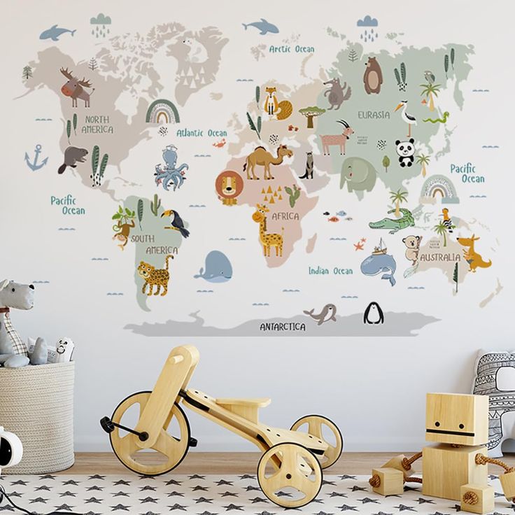 a child's room with a large wall mural and wooden toys on the floor