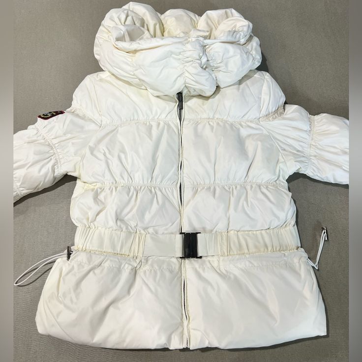 Stay Warm And Stylish This Winter Season With This Triple F.A.T. Goose Down Puffer Jacket. The Jacket Features A Full Zip Hood And Is Made With High-Quality Polyester Material For Durability And Protection. The Insulation Material Is Made Of Down, Providing Extra Warmth And Comfort. This White Puffer Jacket Is Designed For Women In Size L And Is Perfect For Any Casual Occasion. The Jacket Also Comes With A Range Of Features Such As A Hood And A Full Zip That Makes It Easy To Wear And Take Off. G White Nylon Puffer Jacket With Detachable Hood, White Winter Outerwear With Detachable Hood, White Outerwear With Double-lined Hood For Winter, White Parka With Double-lined Hood For Cold Weather, White Puffer Jacket With Double-lined Hood For Outdoor, White Hooded Parka With Double-lined Hood, White Parka With Adjustable Hood, White Hooded Jacket With Detachable Hood For Outdoor, White Long Sleeve Parka With Adjustable Hood