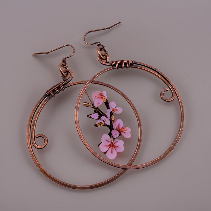 "Embrace the free-spirited essence of bohemian style with our exquisite Boho Style Antiqued Copper Wire Wrapped Big Hoop Earrings. These statement earrings, boasting a generous 2-1/2\" or 3\" diameter, are meticulously crafted to add a touch of artistic flair and bold elegance to any ensemble. The antiqued copper finish exudes a vintage charm, while the wire-wrapped design adds an artisanal touch, creating a unique and eye-catching aesthetic. Each hoop is carefully handcrafted to ensure a one-of Hoop Earrings Big, Hoop Earrings Large, Rustic Earrings, Free Spirit Style, Earrings Big, Big Hoop Earrings, Dangle Hoop Earrings, Gift For Her Birthday, Large Hoop Earrings