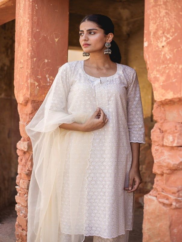 Super cool comfortable Short Chikan Kurti with Chikan Pants and Organza Dupatta perfect for this summer. Color: Ivory Fabric: Kurta & Bottom - Chikan Cotton Dupatta - Organza Note: Length and sizes can be customised Length - Kurta 38 inches Pants 38 inches Dupatta 2.5 mtr Available in other colors The product will be delivered within 2-4 weeks of order placed Wash Care - Dry clean only Size Chart- SIZE BUST WAIST HIP US&CAN UK&AUS XXS 32" 30" 32" 4 8 XS 34" 32" 34" 6 10 S 36" 34" 36" 8 12 M 38" White Cotton Sharara With Self Design, Traditional Anarkali Set With Sheer Dupatta For Summer, White Straight Kurta Anarkali Set For Summer, Summer Straight Kurta Pant Set With Resham Embroidery, White Unstitched Summer Anarkali Set, Elegant Summer Anarkali Set With Chikankari Embroidery, Summer Pant Set With Resham Embroidery Straight Kurta, Summer Pant Set With Resham Embroidery And Straight Kurta, Summer Wedding Cotton Anarkali Set