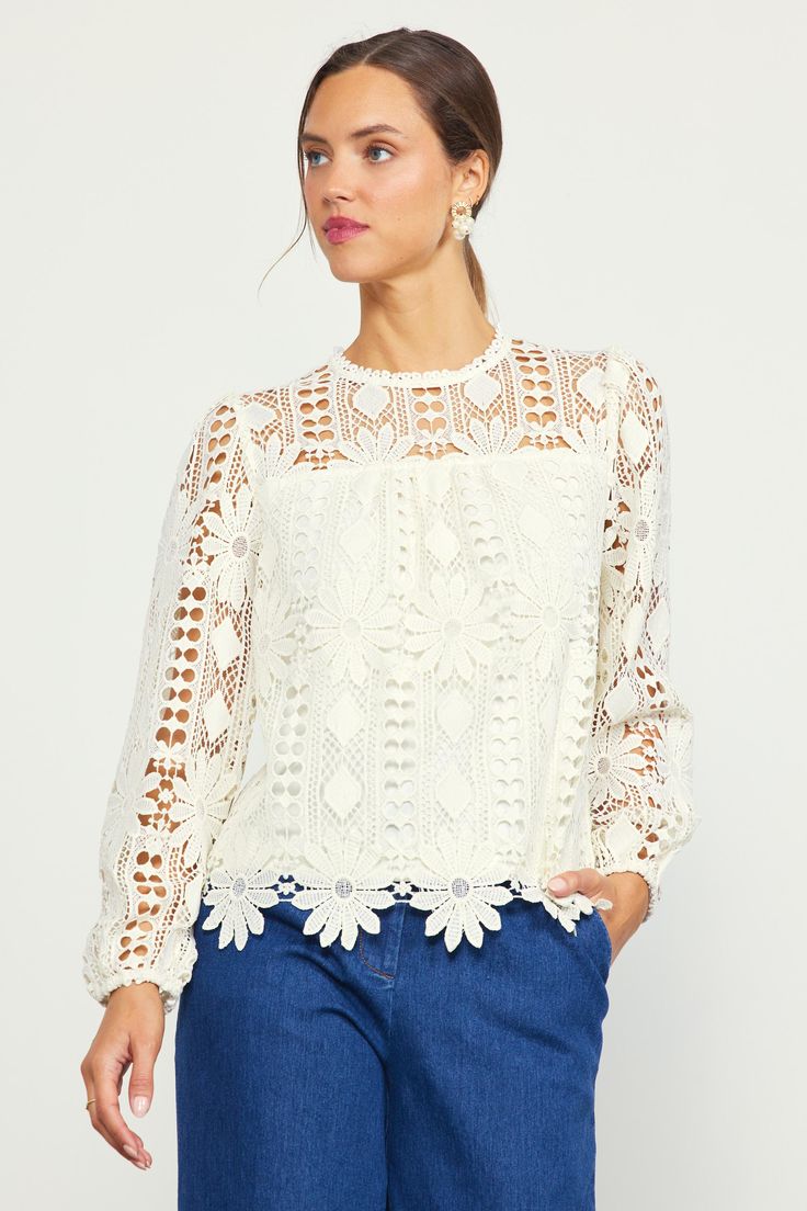 Crafted from embroidered open-eyelet lace, this long-sleeve blouse has lots of textural richness. It's got a floral motif woven in, creating a standout scalloped hem. The airy top features a round neckline and a back keyhole that's fastened by a loop button at the interior. •Round neckline •Long sleeves •Partially lined •Back keyhole with button •Relaxed fit Item Number: 45924 100% POLYESTER Summer Floral Embroidered Long Sleeve Lace Top, Summer Long Sleeve Lace Top With Floral Embroidery, Long Sleeve Lace Top For Spring, Spring Long Sleeve Blouse With Scalloped Lace, Long Sleeve Scalloped Lace Blouse For Spring, Spring Lace Blouse With Lace Trim, Spring Scalloped Lace Top, Spring Long Sleeve Blouse With Lace Trim, Spring Long Sleeve Top With Lace Trim