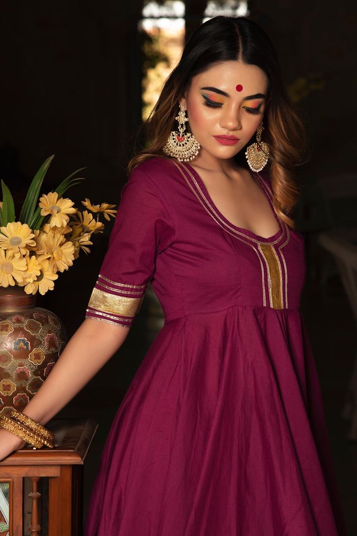 Be the paradigm of classic whenever you dress up in this cotton anarkali Suit Set. The combination of royalty and style is surely something that will make you look different from the crowd! beautiful and stylish this set comes with a jaal work cottonand dupatta that adds an extra charm! PRODUCT DESCRIPTION: Kurta & Pant: Cotton Dupatta: Pure Cotton Color: Burgundy No. Of Components : Set of 3 Embroidery Details: Lace Work Wash Care : Dry Clean Customization : Only Size and Length Of Product SKU# Bollywood Cotton Palazzo Set For Wedding, Bollywood Style Wedding Cotton Palazzo Set, Fitted Cotton Salwar Kameez With Gota Work, Cotton Anarkali Dress With Pallu, Cotton Anarkali Sharara With Traditional Drape, Designer Cotton Palazzo Set With Gota Work, Elegant Cotton Anarkali Set With Gota Work, Elegant Designer Cotton Salwar Kameez, Fitted Cotton Bollywood Anarkali Set