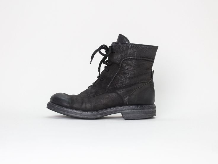 "grained leather combat boots in black. round toe. thick heavy duty soles produced by Italian company, Silga. label: n/a material: leather condition: excellent - has a whitish mark on the left toe box, some wear to the back of heels size: 37 (EU), fits true to size insole 9.75\" ball of foot 3.75\" heel 1.25\" outsole 10.5\" shaft height 5.5\" *PLEASE PROVIDE CONTACT NUMBER UPON CHECKOUT, THANK YOU!*"