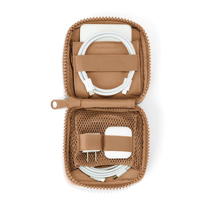 Dagne Dover Wins the Award For Most Clever Travel Gift | domino Charger Pouch, Travel Tech Organizer, Teresa Caruso, Tech Organizer, Must Have Travel Accessories, Tech Organization, Tech Pouch, Dagne Dover, Knick Knack