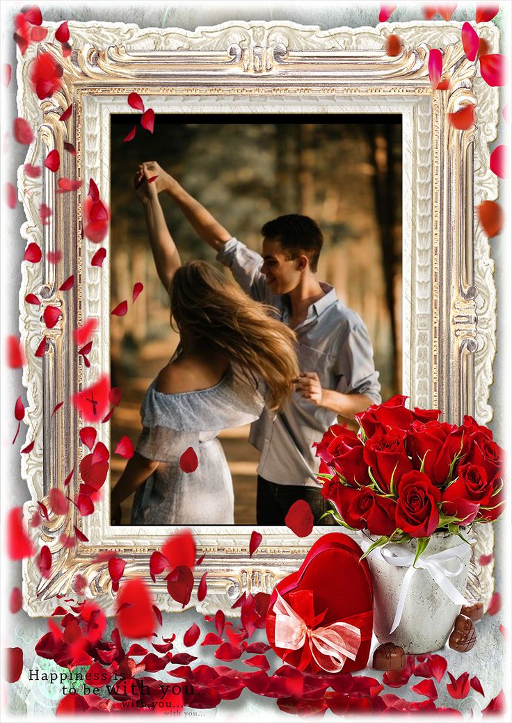 a man and woman dancing in front of a frame with red roses on it, surrounded by petals