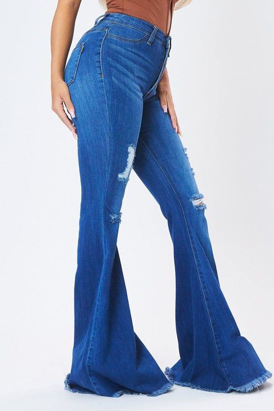 Raw Hem Distressed Bell Bottom Super Stretchy High Waisted Pockets 60% Cotton, 32% Modal, 7% T400, 1% Lycra (S) Rise: 10.5" Inseam: 34.5" Model is 5'4" and wearing a size 3 Size 1: 24 Size 3: 25 Size 5: 26 Size 7: 27 Size 9: 28 Size 11: 29 Size 13: 30 Size 15: 31 Blue Jean Bell Bottoms, Destroyed Jeans, Denim Flares, Bell Bottom, Country Outfits, Petite Outfits, Spring Outfits Casual, Dark Denim, Fit & Flare