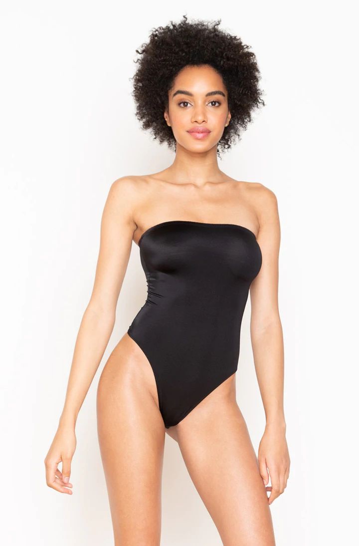 Second Skins strapless bodysuit Strapless Smoothing Shapewear Bodysuit, Strapless Smoothing Bodysuit Shapewear, Elegant Strapless Smoothing Bodysuit, Chic Solid Color Bodysuit With Built-in Bra, Strapless Shapewear Bodysuit With Lined Body, Chic Solid Bodysuit With Built-in Bra, Solid Strapless Smoothing Bodysuit, Strapless Stretch Shapewear Bodysuit, Shapewear Bandeau Bodysuit With Built-in Bra