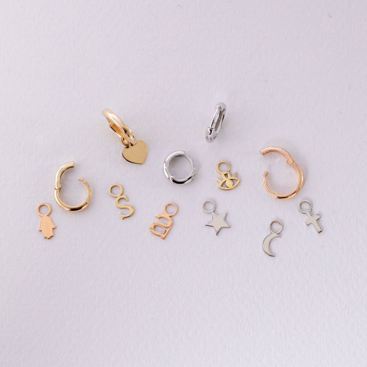 14K 18K Solid Gold Small Tiny Charms, Dainty Everyday Gold Figures For Hoop Earrings, Custom Handmade Charms, Cute Gift For Her We can add these charms to our hoop earrings model your purchased from us. Material: Solid Gold (not gold filled or gold plated) Karat: 14 K (585) 18 K (750) Available gold color: Yellow, rose and white gold M o r e * F r o m * U s Goldstore Jewelry - https://etsy.me/3gHtcrZ * Urn Necklaces - https://etsy.me/2Asb4BM * Bar Necklaces - https://etsy.me/2MhoVxO * Name Neckl Everyday Charms Huggie Earrings, Everyday Huggie Earrings With Charms, Anniversary Charms Earrings Round Shape, Yellow Gold Hoop Earrings With Charms, Minimalist Charm Earrings For Gifts, Gold Earrings With Dangling Charms For Everyday, Gold Hypoallergenic Charms, Hypoallergenic Dangle Charms, Hypoallergenic Gold Charms