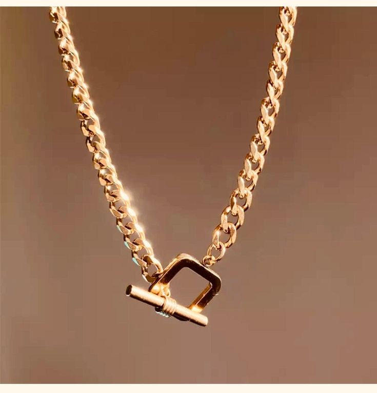 Shop one of our trendiest pieces our 18k gold Plated 3pc set Layering Necklace comes with a square chunky clasp choker chain, Gold Heart chain and a Brown square cubic zirconia stone necklace. Lead and Nickel Free. Elegant Necklace With Rectangular Pendant And Box Chain, Elegant Necklace With Box Chain And Rectangular Pendant, Trendy Metal Necklace With Rectangular Links, Rose Gold Plated Chain Necklace, Chic Metal Necklaces With Rectangular Links, Trendy Metal Necklaces With Rectangular Links, Gold Chain Necklace With Rectangular Pendant, Elegant Gold Chain Necklace With Rectangular Pendant, Modern Jewelry Chunky Chain Choker