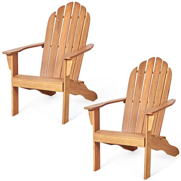 two wooden chairs sitting next to each other