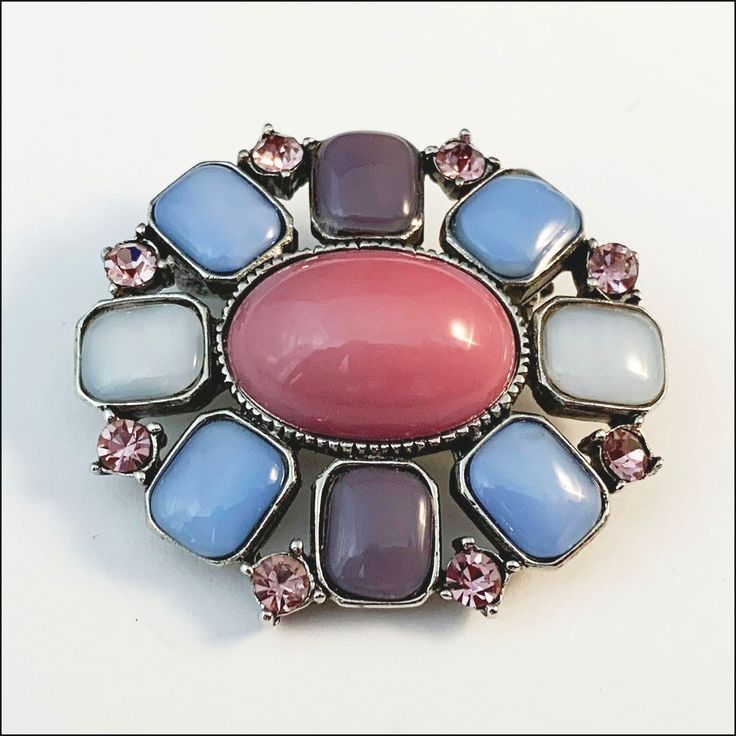 This vintage brooch pin features pastel color cabochons and lavender rhinestones.  The oval pin measures about 1.25 inches by 1.5 inches.  The back is marked LC (for Liz Claiborne) and offers a bar pin with safety clasp.  Excellent condition.  Item: JC0255-tas Roan Mountain, Vintage Liz Claiborne, Dec 8, Vintage Brooch, Liz Claiborne, Vintage Brooches, Tennessee, Brooch Pin, Brooches