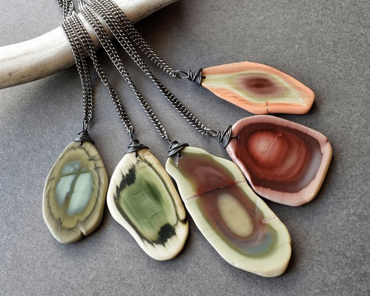 Imperial Jasper Necklace: Carry a piece of the earth's beauty with you wherever you go! This witchy, earthy stone necklace is sure to become a fast favorite in your wardrobe. ✧ Freeform imperial jasper from Mexico ✧ 100% natural stone slices- not dyed or treated ✧ Stone size 30-70mm long (1.2-2.75 inches) ✧ Select your favorite stone from the dropdown menu ✧ Gunmetal chain in your chosen length ✧ Sleek blackened copper wire wrap detail ✧ Hypoallergenic metals available on request ✧ Gift-ready in Nature-inspired Necklace With Large Stone, Earthy Necklace With Natural Variations As A Gift, Earthy Necklace With Large Stone For Gifts, Earthy Style Necklace With Natural Variations For Gift, Earthy Necklace With Natural Variations For Gifts, Red Stone Necklace, Blue Gemstone Necklace, March Birthstone Necklace, Gem Silica