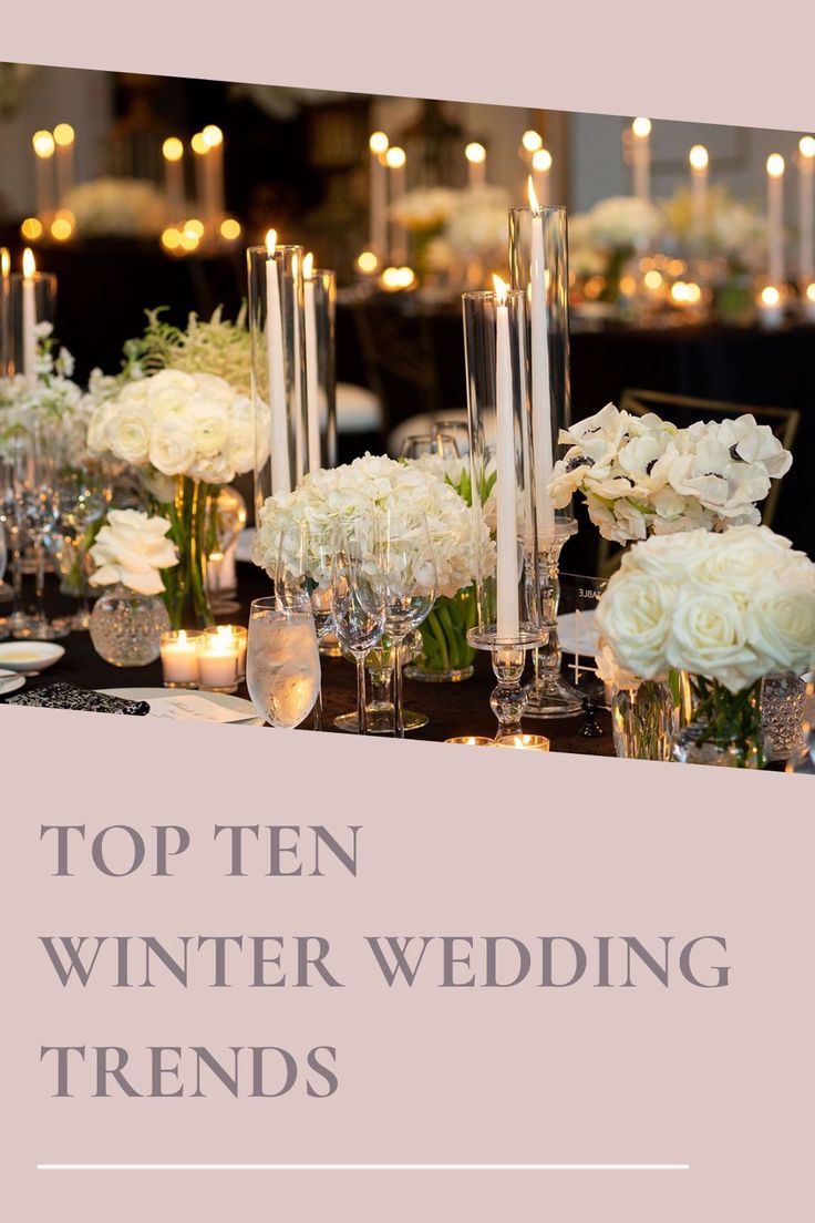 the top ten winter wedding trend is white flowers and candles in vases on a table