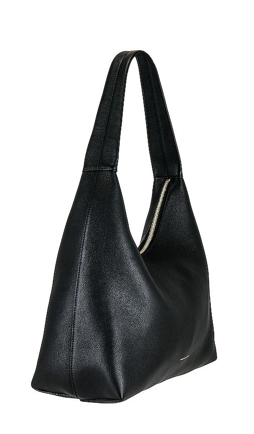 Find MANSUR GAVRIEL Candy Hobo Bag on Editorialist. Mansur Gavriel Candy Hobo Bag in Black. Mansur Gavriel Candy Hobo Bag in Black. Leather exterior with suede lining. Made in Italy. Top zipper closure. One main compartment. Interior leather slip pocket. Integrated shoulder strap. Measures approx 12 W x 11.25 H x 5.5 D Shoulder strap with a 9.5 drop. MANR-WY4. WP23H095WS. Evening Tote Shoulder Bag With Leather Lining, Luxury Everyday Hobo Bag With Zipper Closure, Luxury Hobo Bag With Zipper Closure For Everyday, Chic Leather Hobo Bag With Leather Lining, Luxury Hobo Bag For Shopping, Black Hobo Bag With Leather Lining, Leather Hobo Bag With Zipper Closure, Leather Hobo Shoulder Bag With Leather Lining, Textured Leather Hobo Shoulder Bag