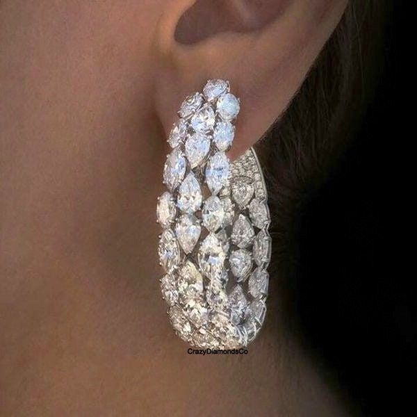 Luxury Large Hoop Earrings, Crafted Pear, Marquise & Round Cut Three Row chandelier Earrings, 14k White Gold Earrings, Earrings For Women  ✹✹𝐖𝐞𝐥𝐜𝐨𝐦𝐞 𝐭𝐨 𝐂𝐫𝐚𝐳𝐲𝐃𝐢𝐚𝐦𝐨𝐧𝐝𝐬𝐂𝐨✹✹ Detail about stones Moissanite & Simulated Stone: ----------------------------- Stone Shape: Marquise Cut, Pear Cut, Round Cut  Stone Size: 6X3 mm, 5X3 mm, 1.50 mm Weight: 20.90 TCW Color: Colorless Cut: Excellent Clarity: VVS ★ 𝑰𝒕𝒆𝒎 𝑫𝒆𝒕𝒂𝒊𝒍𝒔:- ☛ Metal Purity: Solid Gold (10KT, 14KT, 18KT); Silver(925 Sterling, 935 Argentium), 950 Platinum ☛ Metal Tone: Yellow, White, Rose ☛ Stamp/Hallmark: Yes ★ 𝑪𝒖𝒔𝒕𝒐𝒎𝒊𝒛𝒂𝒕𝒊𝒐𝒏:- ☛ Customized Design Jewelry. ☛ All cuts which you dream to make with moissanite. ☛ Updating every step of your ordered jewelry(Loose Stone, CAD & Making Process) ☛ All Diamond Chandelier Earrings, Aesthetic Jewelry, White Gold Earrings, Large Hoop Earrings, Diamond Hoop Earrings, Purple Wedding, Schmuck Design, Chandelier Earrings, Wholesale Jewelry