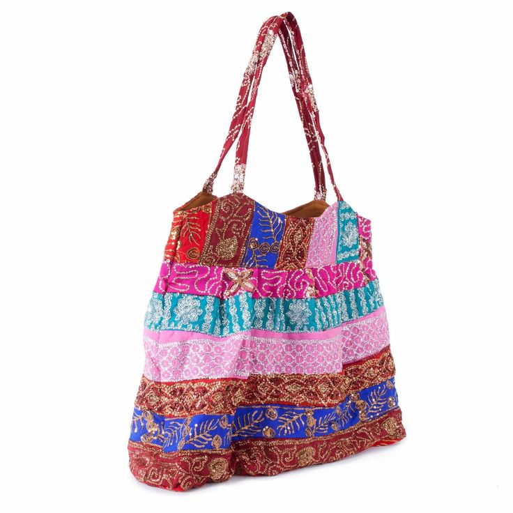 a multicolored handbag on a white background