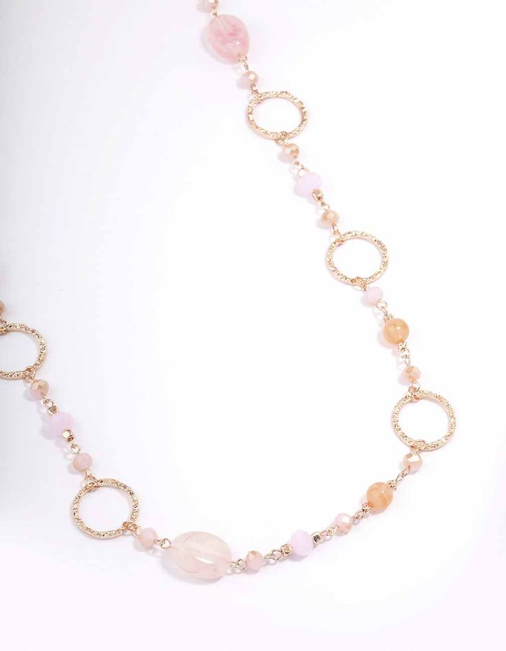 Add interest to your neckline with this unique, beaded necklace. This necklace features a gorgeous, rose gold setting adorned with pink and orange beads for an eclectic look. Material: Beads Weight: 30.5g | Lovisa Rose Gold Long Pink Beaded Disc Necklace Feminine Gold Beaded Necklaces, Rose Gold Beaded Jewelry For Party, Feminine Adjustable Beaded Necklaces, Adjustable Feminine Beaded Necklaces, Adjustable Feminine Beaded Necklace, Party Rose Gold Beaded Jewelry, Adjustable Rose Gold Necklace With Round Beads, Rose Gold Beaded Necklace For Party, Adjustable Rose Gold Beaded Necklace