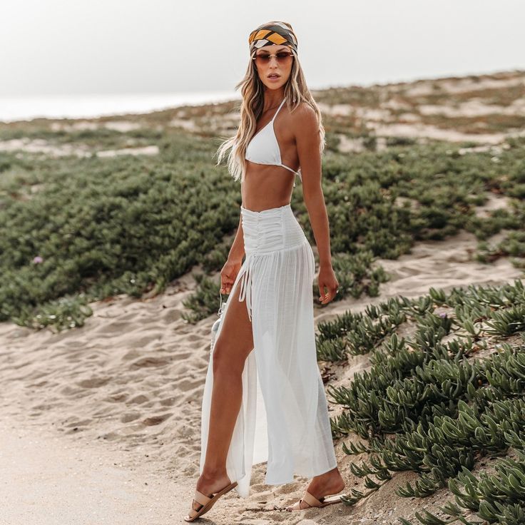 The Black Cover-Up Maxi Skirt is a must-have for effortless beach style. Its flowing silhouette and versatile design make it perfect for layering over your favorite swimsuit. Add a touch of allure to your beach look with our Ruched Waist Split Hem Sarong! The ruched waist and split hem design bring a hint of sophistication to this versatile beach accessory for a chic and stylish layer that effortlessly evokes beach-ready elegance. Product code: CAA07D4A001AA/CAA07D4A001CC Black Cover Up, Beach Ready, Black Cover, Printed Swim, Collars For Women, Beach Accessories, Beach Look, Knitting Women, Sleeveless Maxi Dress