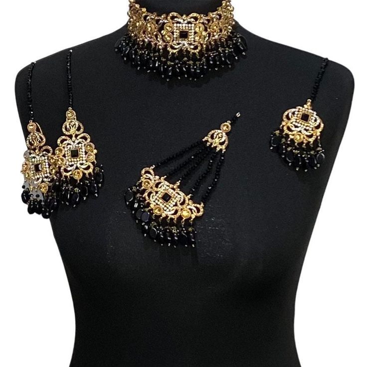 jewellery set. Set includes- Earrings  Tikka Choker Jhumar Traditional Black Jewelry Sets For Festivals, Black Jewelry Sets For Festivals, Black Meenakari Temple Jewelry, Traditional Black Beaded Jewelry For Festivals, Traditional Black Jewelry Sets For Festive Occasions, Black Chandbali Temple Jewelry, Black Jewelry Sets For Festive Occasions, Black Temple Jewelry Set For Festive Occasions, Black Meenakari Jewelry Gift