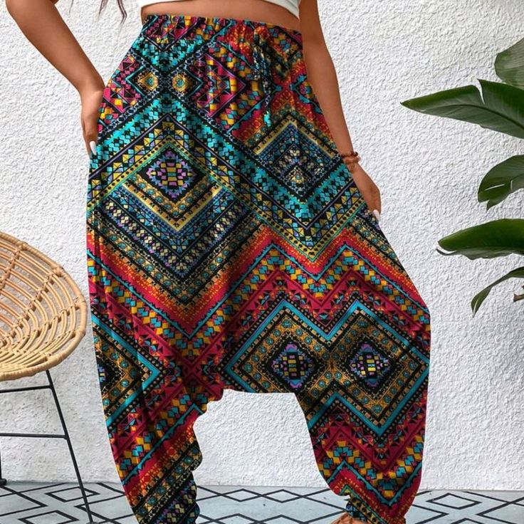 Plus Sz Colorful Geo Print Harem Pants 95% Polyester 5% Elastane Patterned Relaxed Fit Bottoms With Pockets, Multicolor High Waist Harem Pants For Summer, High Waist Multicolor Harem Pants For Summer, Patterned Wide Leg Bottoms With Pockets, Multicolor High-waisted Pants With Elastic Waistband, Multicolor High Waist Pants With Elastic Waistband, Casual High-waisted Festival Pants, Casual Ankle-length Festival Bottoms, Casual Harem Bottoms For Vacation