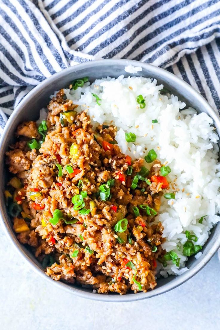 a bowl filled with rice and ground beef