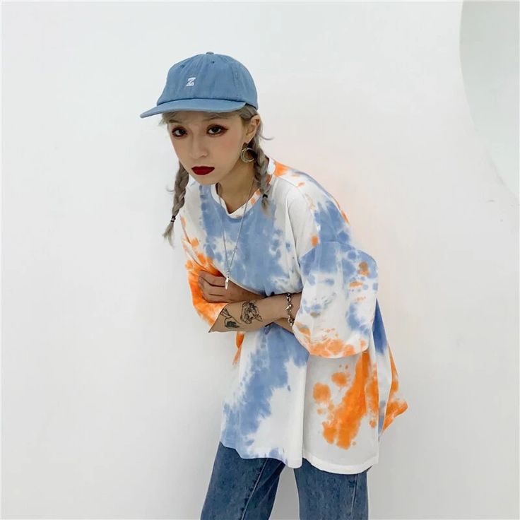 Loose Tie Dye Graphic Short Sleeve Shirt – Tomscloth Oversized Orange Casual Tops, Casual Half-sleeve Tops For Day Out, Oversized Trendy Orange Tops, Trendy Orange Cotton Blouse, Trendy Oversized Orange Top, Trendy Half-sleeve Spring T-shirt, Blue Half Sleeve T-shirt For Spring, Trendy Half Sleeve Tops For Day Out, Casual Crew Neck Shirt For Day Out