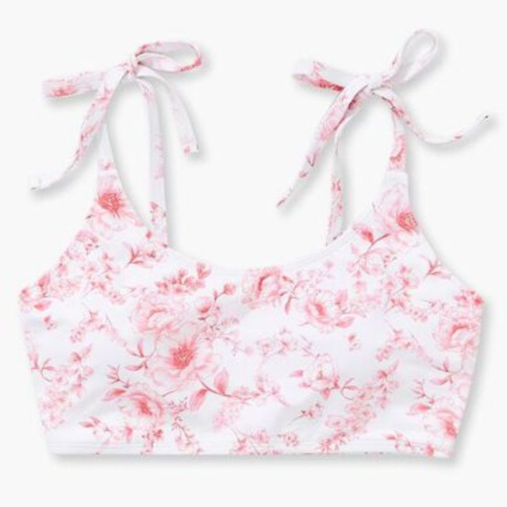 A Stretch-Knit Bralette Bikini Top Featuring A Floral Print, Scoop Neck, And Self-Tie Straps. - Shell: 80% Nylon, 20% Spandex - Lining: 92% Polyester, 8% Spandex Spring Beachwear Seamless Tops, Spring Seamless Beachwear Tops, Spring Beachwear Swimwear With Tie Straps, Spring Tie-side Swimwear For Day Out, Spring Beachwear With Tie Straps, Spring Seamless Swimwear With Tie-side Bottom, Casual Triangle Top Swimwear With Tie Back, Seamless Spring Swimwear With Tie-side Bottom, Seamless Tie-side Bottom Swimwear For Spring