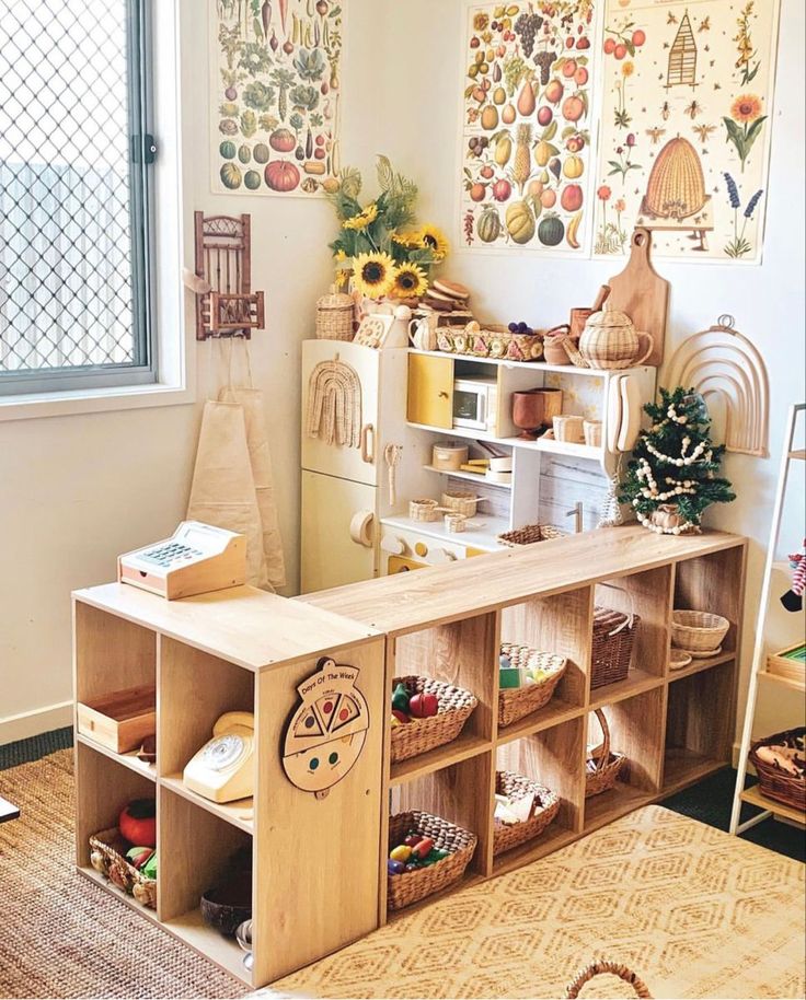 a child's playroom with toys and decorations on the wall, including shelves