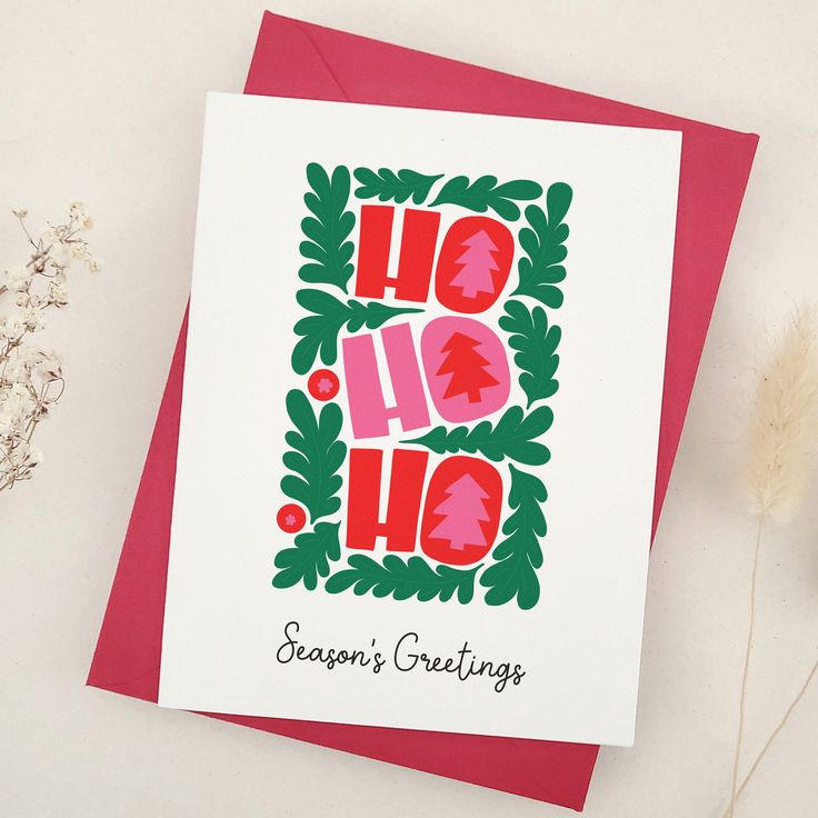 a red and green christmas card with the words ho hoo written in bold letters