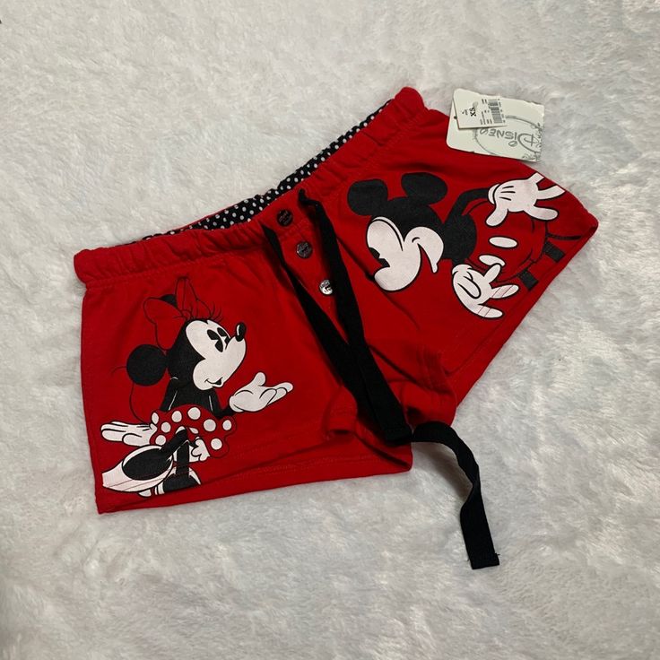 Disney Red Shorts. Mickey And Minnie Graphic. Elastic Waist Band With Drawstring. Super Cute! Cute Mickey Mouse Cotton Bottoms, Casual Cotton Mickey Mouse Sleepwear, Minnie Mouse Cotton Sleepwear, Cotton Minnie Mouse Sleepwear, Minnie Mouse Cotton Sleepwear For Loungewear, Cotton Minnie Mouse Sleepwear For Loungewear, Mickey Mouse Cotton Sleepwear For Loungewear, Cotton Mickey Mouse Sleepwear For Loungewear, Casual Mickey Mouse Bottoms For Loungewear