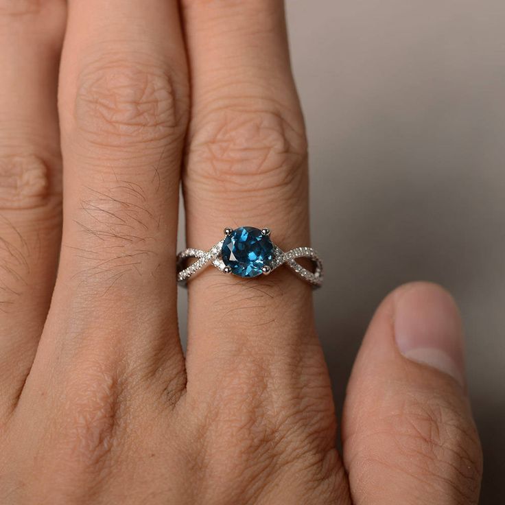 This is a gorgeous handmade creation. Its beauty is its simplicity & Elegance. The 7*7 mm round shape faceted real London Blue Topaz is crafted in solid sterling silver and with rhodium plated. All item is sent in a beautiful gift box If you have any idea of design your ring,pls contact me directly. You can realize more lovely stuff clicking the link https://www.etsy.com/shop/knightjewelry?refshopsection_shophome_leftnav Please leave the correct address and you phone number for delivering su 14k White Gold Topaz Birthstone Promise Ring, Sterling Silver Topaz Gemstone Ring, Gift Round Cut Topaz Birthstone Ring, Topaz Birthstone Jewelry In Round Cut, Blue Topaz Solitaire Promise Ring, Promise Topaz Ring, Gift Topaz Birthstone Ring With Round Cut, Topaz Ring With Round Stone, Gift Topaz Solitaire Ring