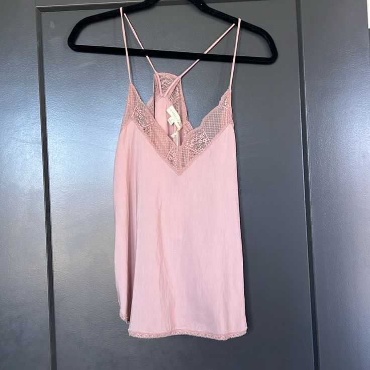 Lacey Neckline Camisole Mauve Pink Never Worn, Tags Attached Feminine Tank Top With Built-in Bra, Chic Sleeveless Lace Top With Built-in Bra, Feminine Spring Tank Top With Tank Straps, Spring Tank Camisole With Built-in Bra, Feminine Stretch Tank Top For Day Out, Feminine Tops With Lace Trim And Tank Straps, Summer Stretch Camisole With Lace Trim, Spring Lace Cami Top With Built-in Bra, Feminine Sleeveless Tank Top With Built-in Bra