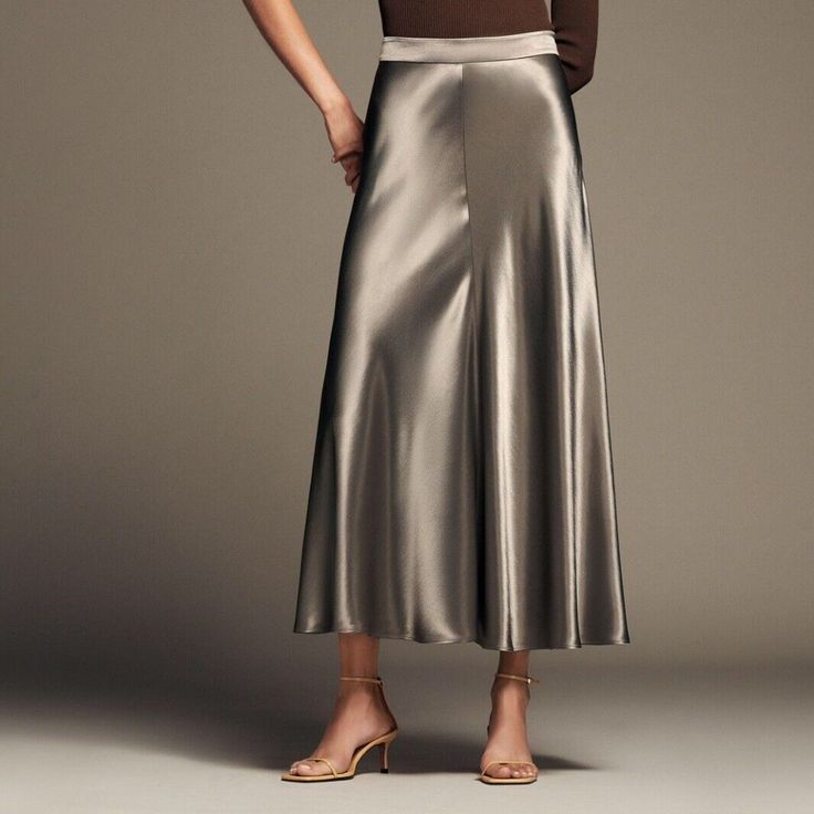 Beautiful And Timeless Satin Effect Midi Skirt By Zara In Size Medium In Taupe 100% Viscose Fabric Is Soft And Shiny Giving The Skirt An Elegant Appearance. Skirt Contains Side Zipper Enclosure Versatile And Can Be Dressed Up Or Down. Wear With A T-Shirt Or Tank And Sandals. Or Dress Up For A Party Or Night Out. Measurements: Waist: 28-29" Length: 37" Ships From Smoke And Pet Free Home. Elegant Full Length Lined Bottoms, Chic A-line Satin Bottoms, Elegant Skirted Satin Bottoms, Elegant Silk A-line Bottoms, Elegant A-line Silk Bottoms, Elegant Full Length Solid Color Skirt, Elegant Full-length Spring Skirt, Elegant Full-length Skirt For Spring, Elegant Full Length Skirt For Spring