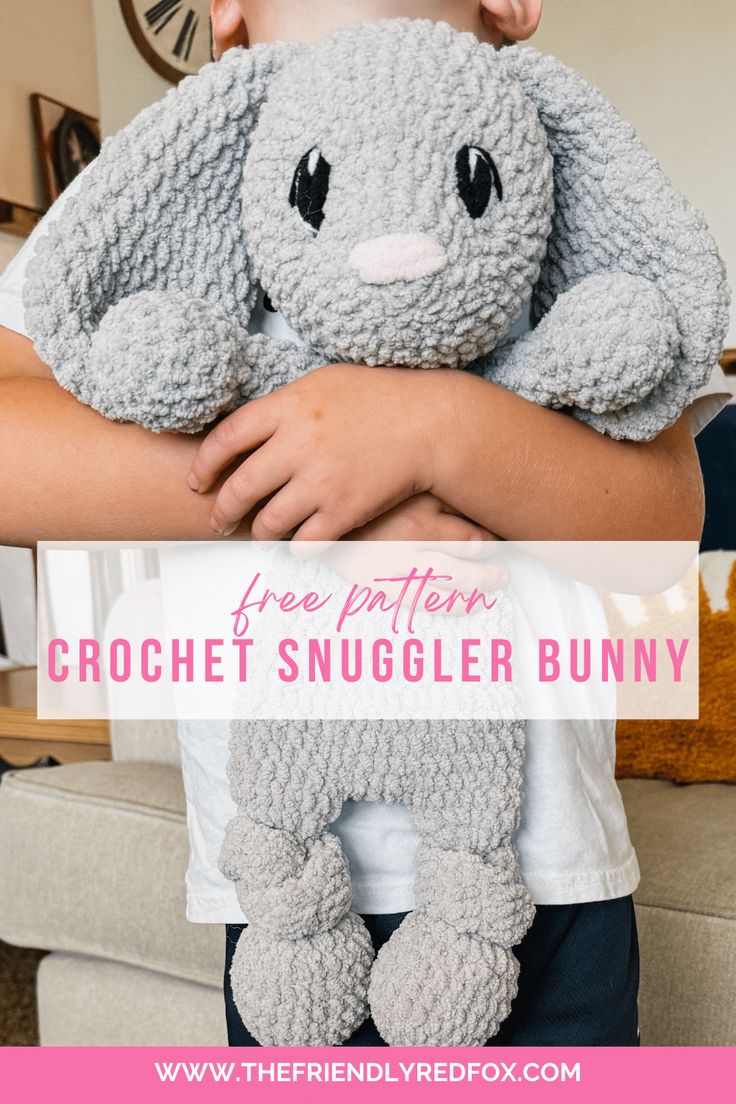 a little boy holding a stuffed animal with the words crochet snuggler bunny on it