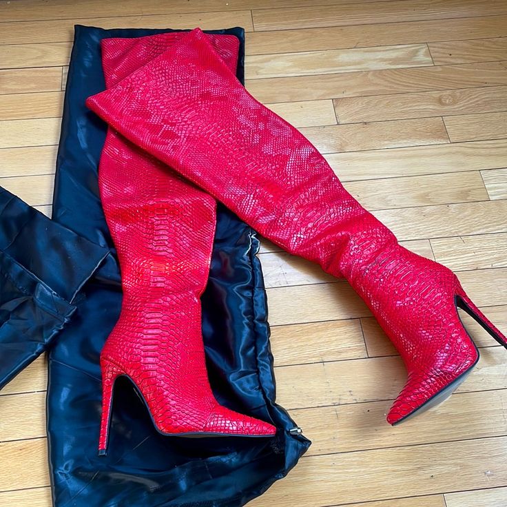 Python Red Vixen Thigh High Boots *New* This Is A Sexy Shoe Right Here Show Stopper For Sure This Is A Sexy Thigh High Snake Embossed Leather. This Is Perfect For Any Outfit Wether Casual Or A Night Out. This Has A 4 1/2 Inch Heel. Comes With A Shoe Dust Bag For Each Boot. Size Us 5 / European 35 Multi Color Thigh High Boots, Trendy Red Knee-high Boots For Party, Trendy Red Knee-high Party Boots, Bold Pointed Toe Fitted Boots, Red Knee-high Party Boots, Red Knee-high Boots For Party, Red High Heel Boots For Club, Red Knee-high Boots For Evening, Fitted Red Knee-high Boots For Party